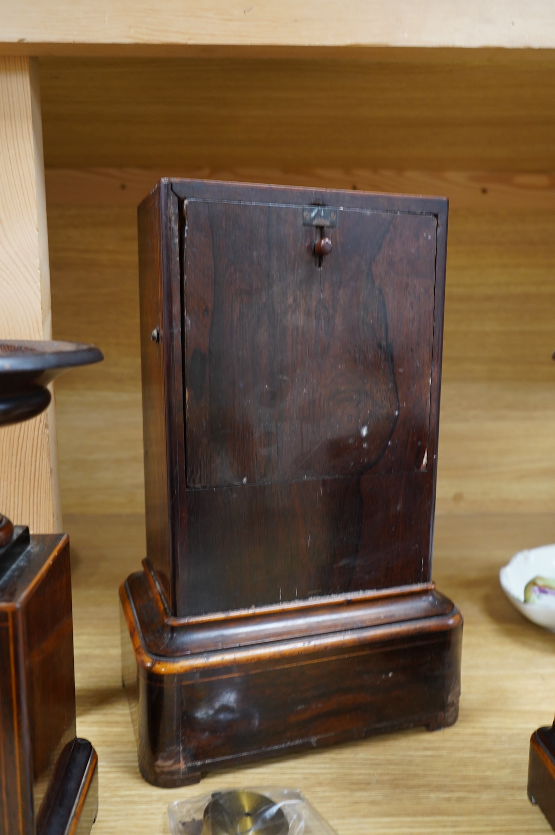 A late 19th century rosewood marquetry clock garniture by Graham, London, 35cm